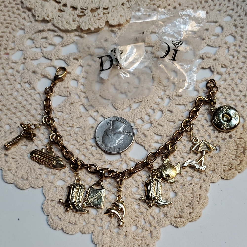 DI" Diamonds International Charm Bracelet And 9 Cruise Ports Charms Gold Tone